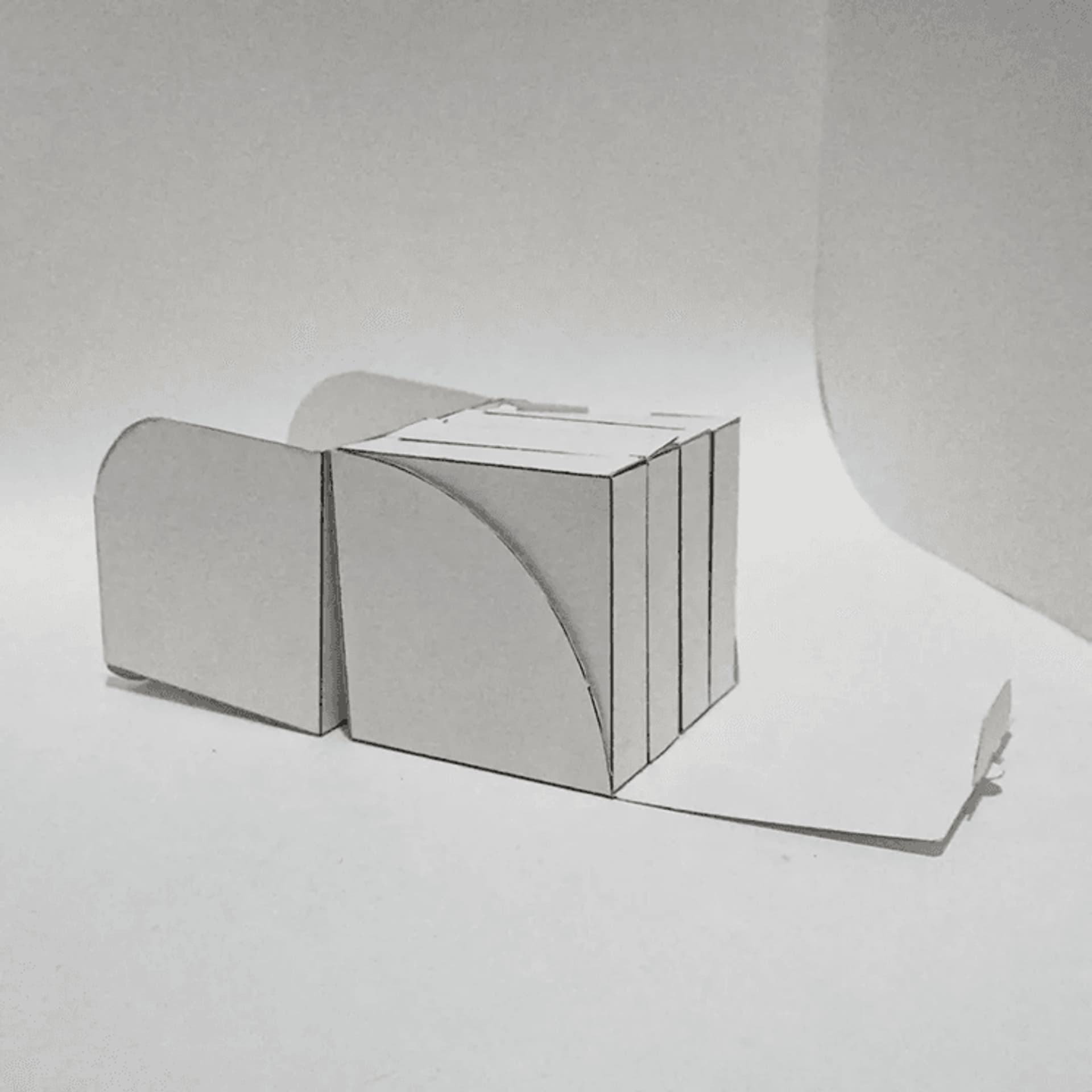 Minimalist white box design with curved edges, suitable for packaging or storage. Ideal for creative projects.