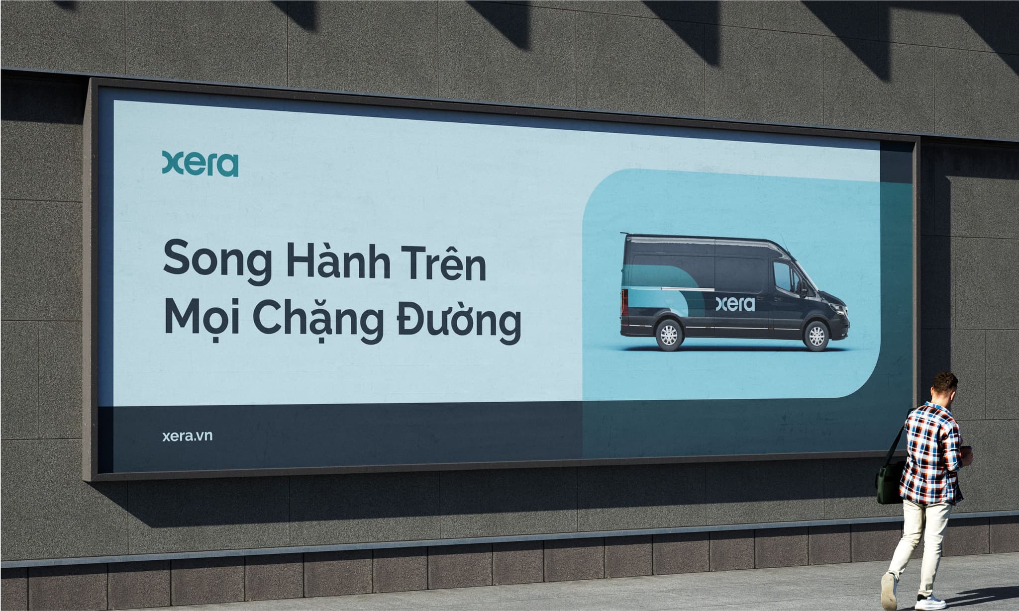 Billboard displaying a Xera van with Vietnamese text promoting road travel, set against a modern urban backdrop.