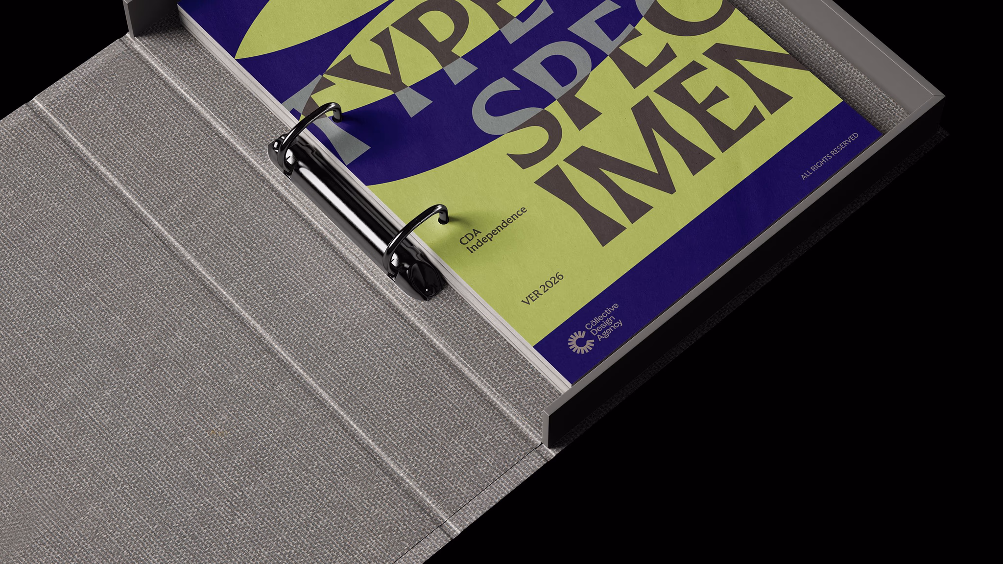 Opened book titled “Freedom’s Arm” on a gray hardcover display stand, close-up of cover and pages