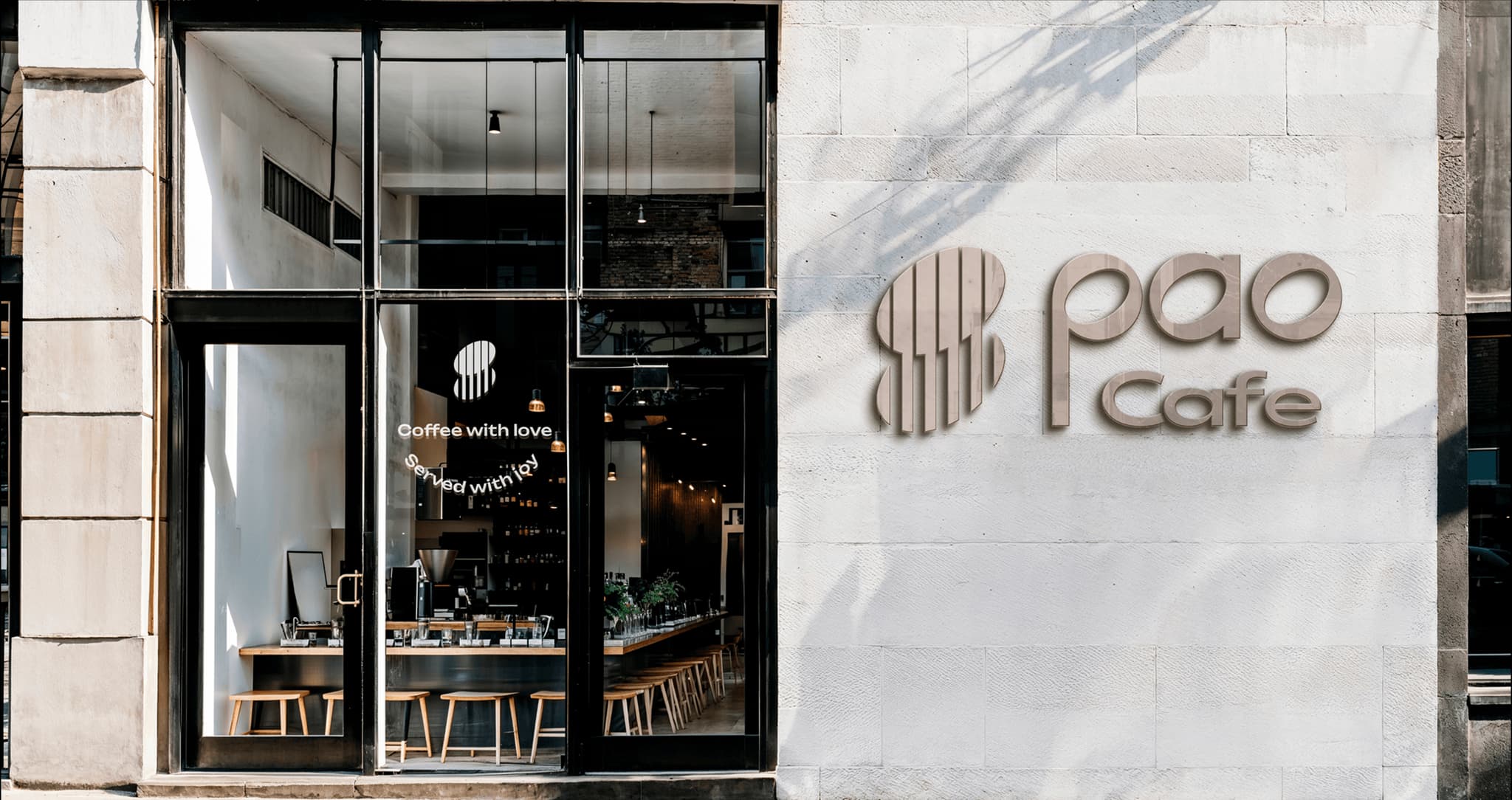 Modern cafe exterior with "Pao Cafe" sign, featuring large windows and inviting design elements.