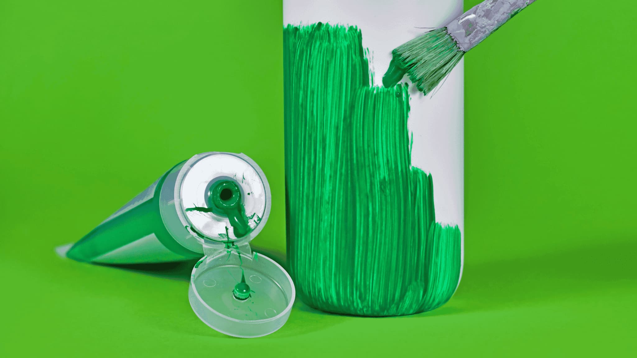 Greenwashing – a product being painted green to appear eco-friendly.